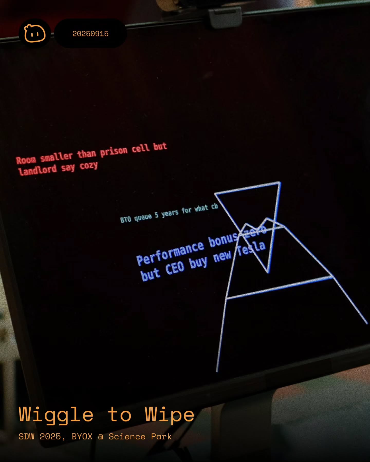 close-up of the monitor: a blue wireframe figure among singlish complaints, titled wiggle to wipe, sdw 2025, byox at science park