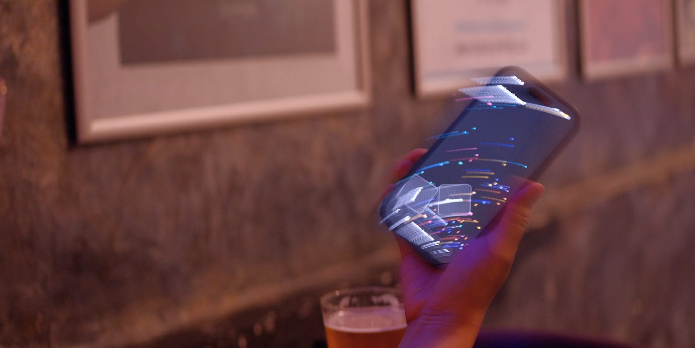 long exposure: the screen smears into light trails as the phone is shaken